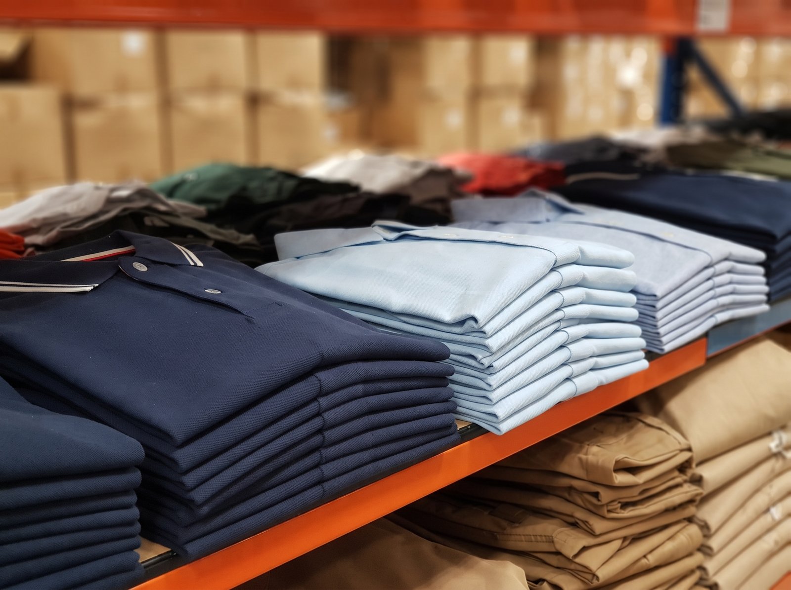 Men's polos and shirts stacked